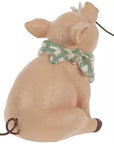 Pig Holding Flower Decor