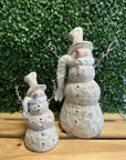 Whimsical Snowman with Braided Scarf