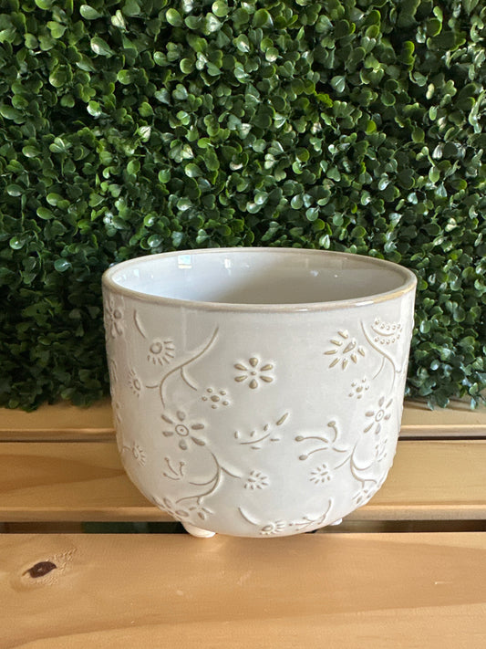 Embossed Floral Ceramic Planter – Creamy White on Pedestal Feet