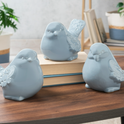 Blue Scroll Wing Bird